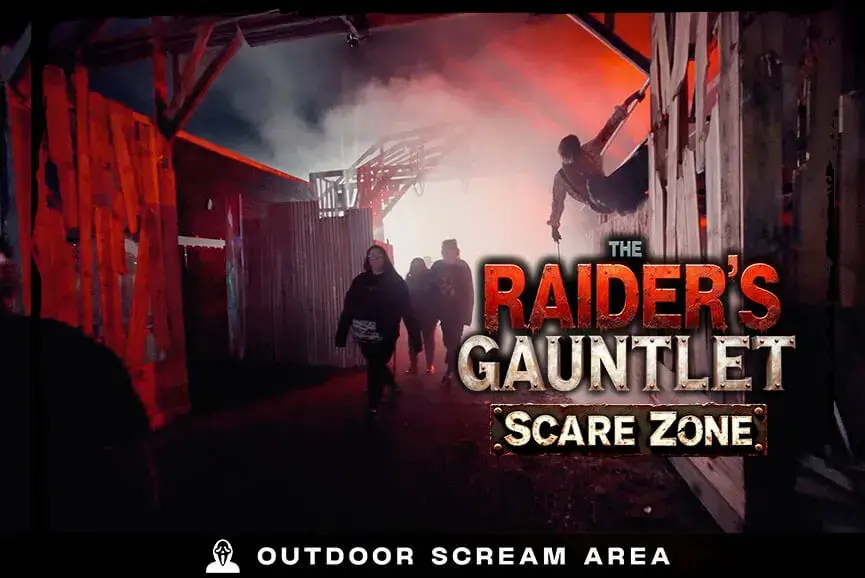 Visitors escaping fog-filled haunted zone at Fear Fest