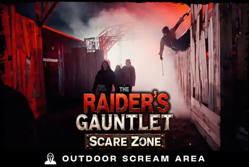 Visitors escaping fog-filled haunted zone at Fear Fest