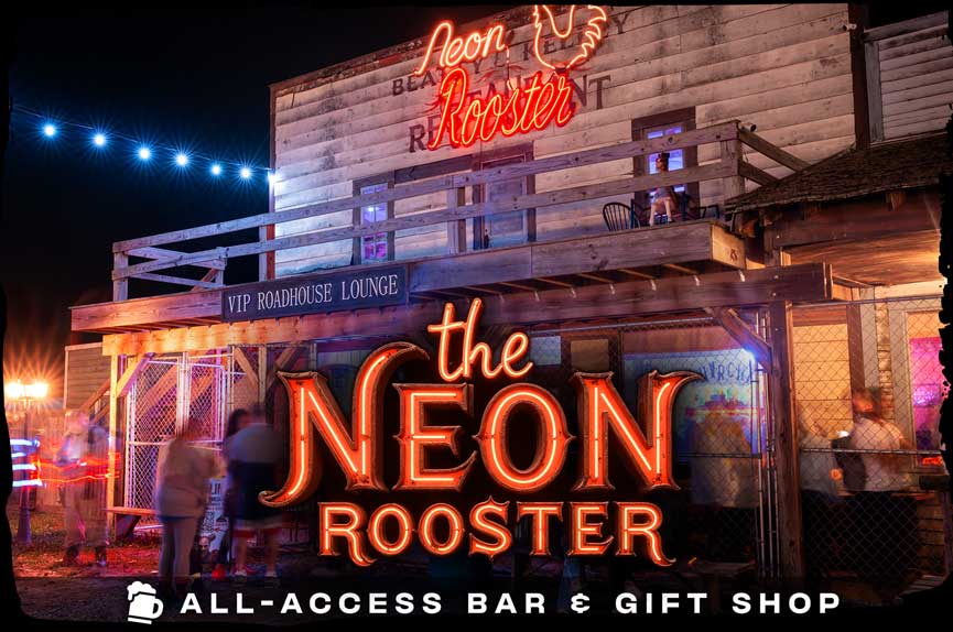 A rustic, two-story wooden roadhouse at night featuring a bright red neon rooster sign on the roof and warm lights glowing from within. The text reads "The Neon Rooster. All-Access Bar & Gift Shop."
